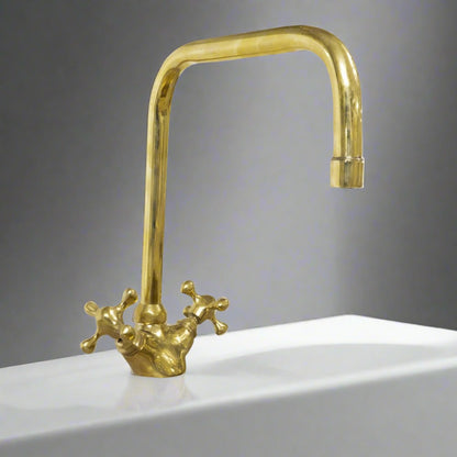 unlacquered brass bathroom faucet